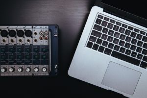 aerial view of laptop and sound mixer